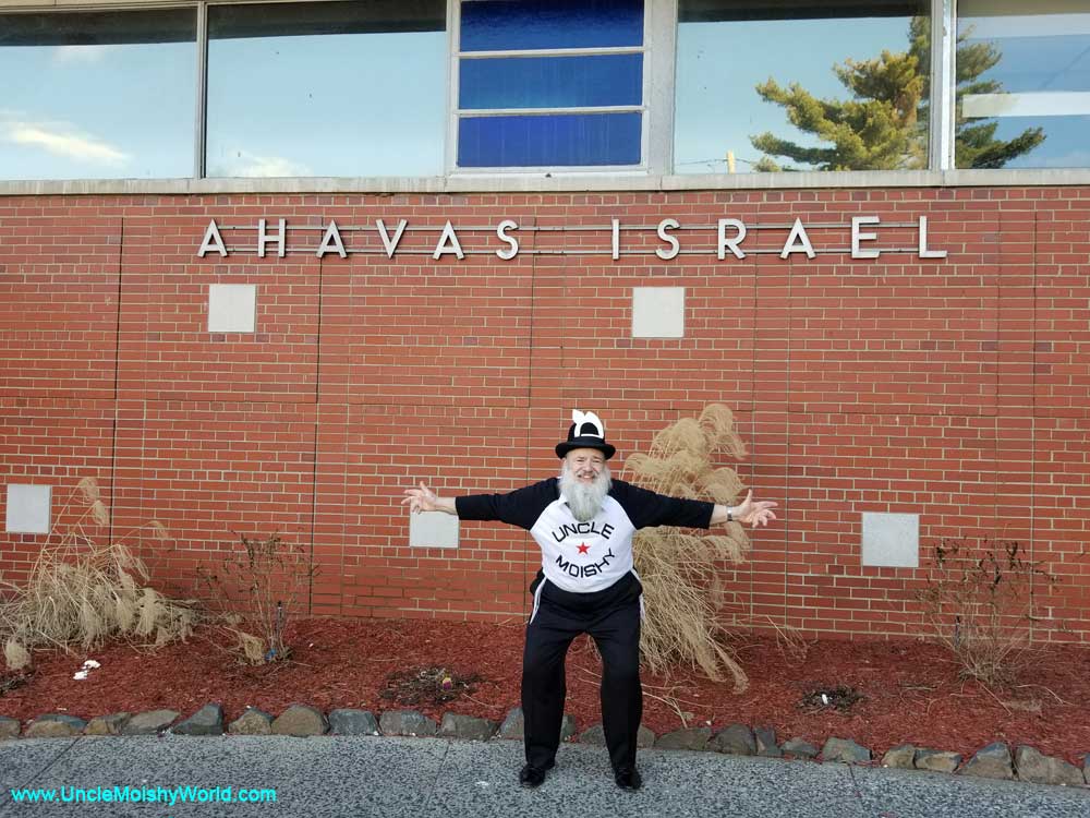 The original and world-renowned Uncle Moishy posing in front of the Ahavas Israel.