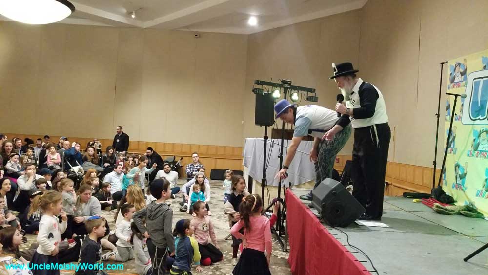 Uncle Moishy and other Jewish children entertainers engage their audience.