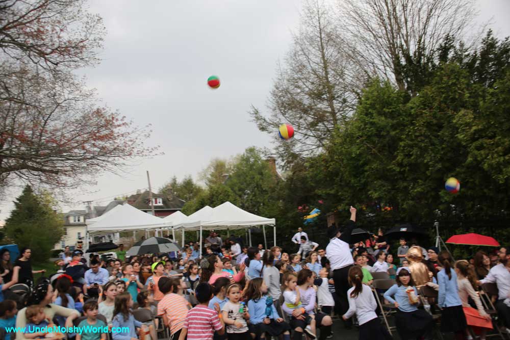 Audience tossing beach balls at Uncle Moishy's Jewish music concert in Waterberry, Connecticut.